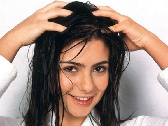 Massage Oil into Hair - Natural Home Remedies for Hair Loss